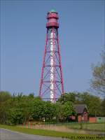 Leuchtturm Campen. Die dreibeinige, rot-wei gestrichene Stahlbein-Konstruktion wurde ab 1888gebaut und im Jahre 1892 fertiggestellt. Mit einer Hhe von 65 Meter ist er der hchste Leuchtturm Deutschlands. Im Maschinenhaus des Turmes versieht ein MAN-Dieselmotor DM 20 seit 1906 seinen Dienst. 

