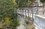 Schweiz - Eisenbrücke über den Inn bei Cinuos-chel-Brail am 15.10.2008. Baujahr 1897 BOSSHARD & CIE Näfels, Belastung für Fuhrwerk 6 Tonnen.