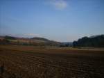 Frankenwald Blick am 19. M�rz 2010 aus Richtung Norden �ber ein Acker auf die Festung Rosenberg und den Festungsberg in Kronach.