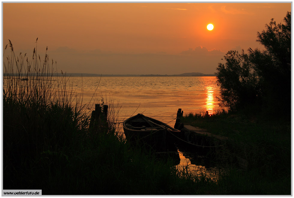 Sommer auf Usedom 2010: Sonnenuntergang ber dem Peenestrom am Lieper Winkel