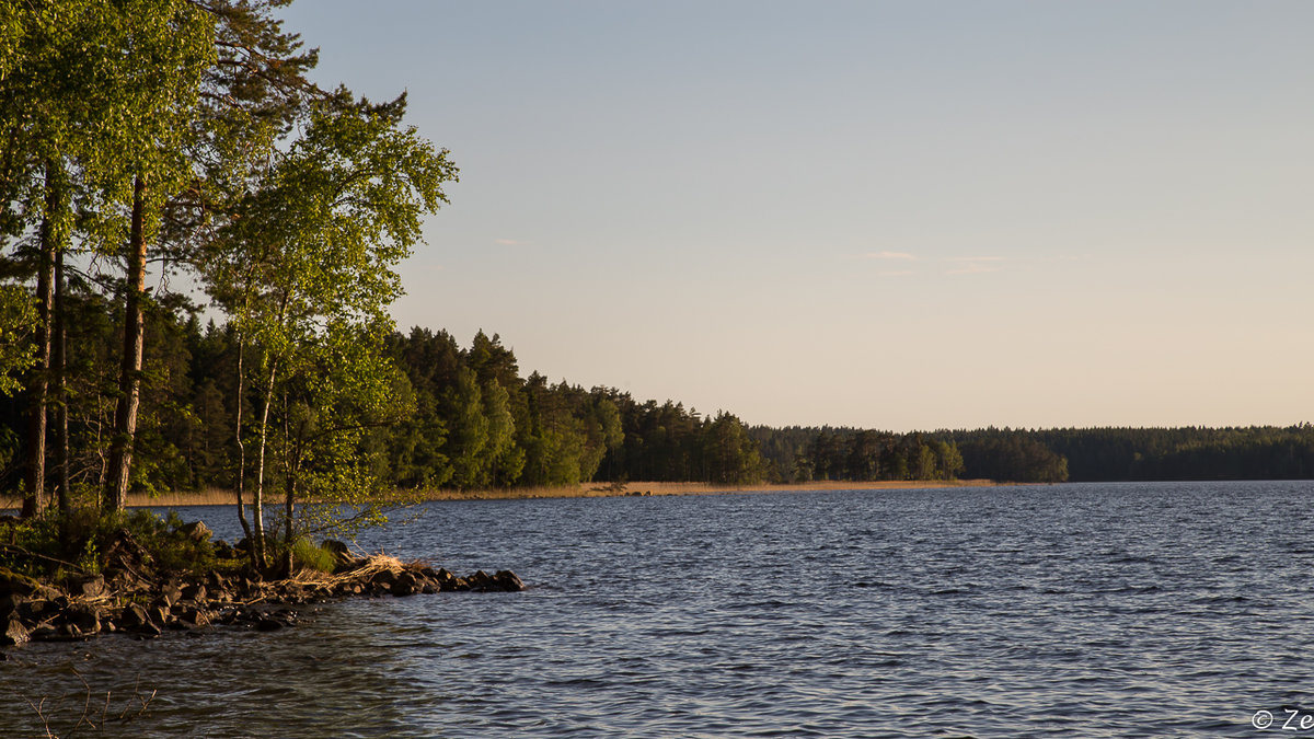 Lake Unden at Tived, Sweden at Sunset.
Der Undensee in Tived, Schweden bei Sonnenuntergang.
Juni 2014