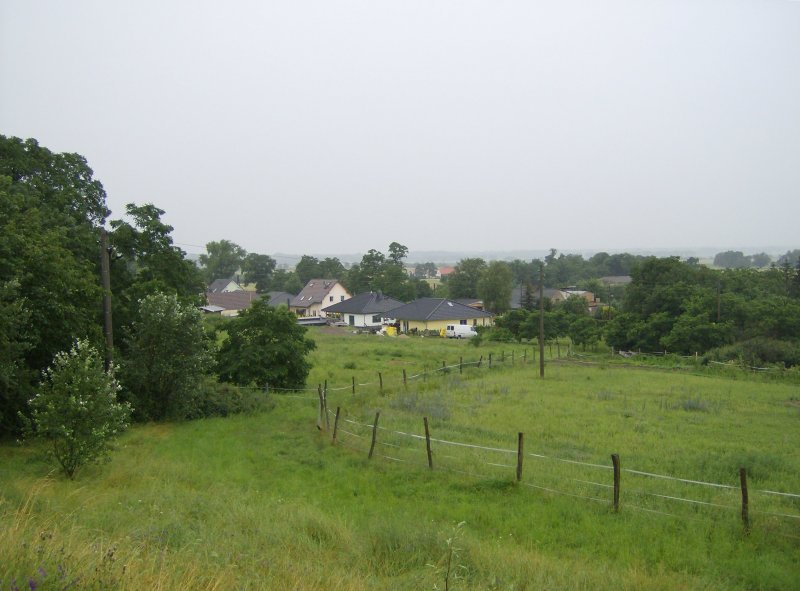 Podelzig, Ortsteil NeuPodelzig Unterdorf, gesehen am Regentag 04.07.09