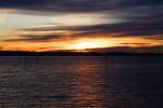 Der Bodensee und die dahinterliegenden Alpen im Sonnenuntergang, Friedrichshafen, 03.01.12