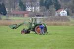 Der bauer bei seiner tglichen arbeit.