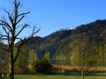 Weissensee im Allgu, Blick ber den See auf die Alpen, April 2014