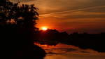 Sonnenuntergang im Spreewald über der Spree im Sommer 2020.