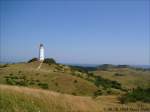 Seit ber 100 Jahren ist der 28 Meter hohe Hiddenseer Leuchtturm im Hochland von Kloster das Wahrzeichen der Insel.