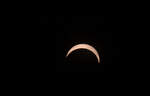 Partielle Mondfinsternis vor R�gen 12.08.2026. Der Mond hat gerade den gr�ssten Teil der Sonne abgedeckt.
