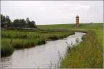 Ein Wahrzeichen der Krummhrn ist der Leuchtturm bei Pilsum. 01.09.2009