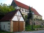 Bauernhof in Borna-Gersdorf,die Milchkanne auf der Milchrampe wurde wohl
vergessen zu DDR-Zeiten noch abzuholen.aber schn das man es noch sehen kann