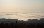 Wernigerode unter einer dichten Wolkendecke im Gegenlicht der Morgensonne; Aufnahme vom frhen Morgen des 12.07.2013 auf dem Brockenbahnhof...