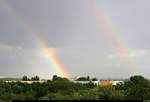 Zwei Regenbögen zeigen sich nach einem leider zu maßvollen Regenschauer über Halle-Neustadt.