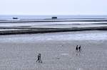 Das Wattenmeer bei Ebbe vom Deich bei Lüttmoorsiel aus gesehen.