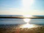 Sonnenspiegelung am Strand von St.