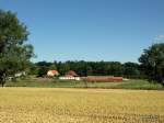 Blick auf einen Bauernhof beim Kneeden.