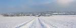 Winter-Panoramaversuch von Kirchheim bei Euskirchen. Rechts Nebelwand, Rest in der Sonne  - 26.01.2010