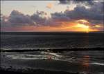 Sonnenuntergang am Wattenmeer in Norddeich.