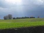 von der Straße Moltow nach Dorf Mecklenburg, in der Nähe Kietzin (NWM), konnte ich diese schöne Aufnahme schießen, wo ein Loch in der Wolkendecke ein Sonnenstrahl durch blinzelte, 04.04.2010