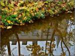 Die Schule Ecole Prive Sainte Anne in Ettelbrck spiegelt sich in dem Flchen Wark.