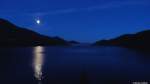 Fastvollmond am frühen Morgen des 18.01.2014 über dem Fuschlsee von Fuschl am See aus (bei Salzburg) vor Sonnenaufgang