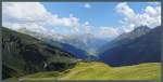 Blick vom Galzig auf die eindrucksvollen Kulisse der Lechtaler Alpen: In Bildmitte ist die 3036 m hohe Parseierspitze zu sehen, der höchste Punkt der Lechtaler Alpen.