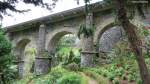 Schöne alte Brücke der früheren Zahnradbahn oberhalb vom  Monte Palace Tropical Gardens  oberhalb von Funchal/Madeira (März 2014)