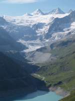Lac de Moiry mit Glacier de Moiry, Grand Cornier (3962m) und Dent Blanche (4357m), aufgenommen auf dem Weg zum Lac des Autannes am 2.8.2004 um 9:12 Uhr