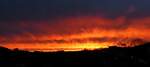 Den ganzen Tag Schmuddel Wetter, abends beim Sonnenuntergang bricht die Wolkendecke auf und der Himmel färbt sich Glutrot über dem Norden von Luxemburg.13.03.2023
