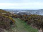 Isle of Man - Atemberaubende Küstennatur und Kleinstädte in friedlicher Koexistenz. Die im Bild zu sehende kleine Stadt Port Erin zählt gerade einmal gut 3500 Einwohner. 