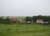 Podelzig, Ortsteil NeuPodelzig Unterdorf, gesehen am Regentag 04.07.09