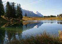 Spiegelbilder am Bergsee Lac Retaud. (1690 m.�.M)
(Oktober 2008)
